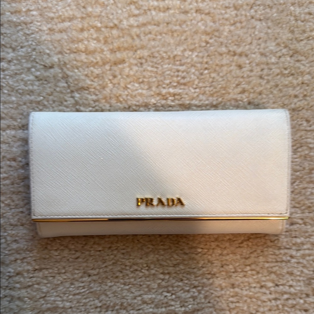 Prada White Leather Wallet with Gold Logo**gently used**